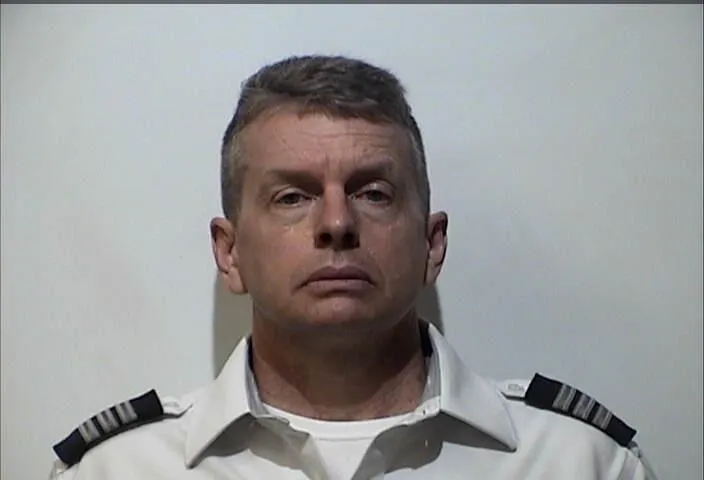 Shock as American Airlines pilot charged with triple homicide